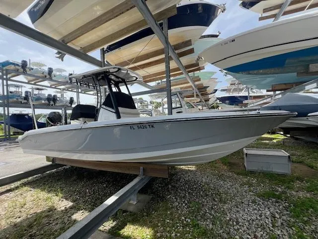 The Image of 2023 Boston Whaler 250 Dauntless boat on storage rack, side view. - 0