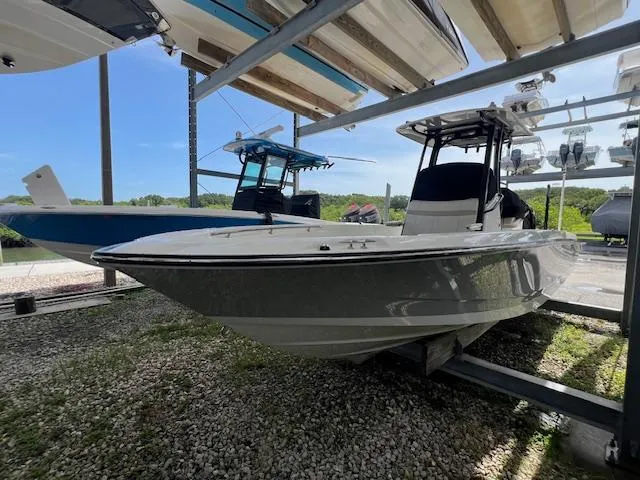 Slide: The Image of 2023 Boston Whaler 250 Dauntless boat in storage, side view. - 20