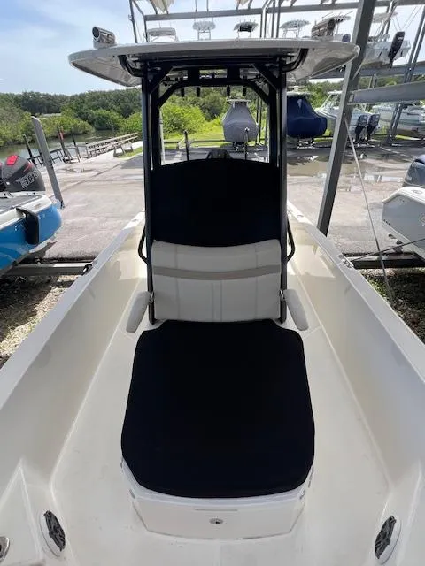 Slide: The Image of 2023 Boston Whaler 250 Dauntless boat interior with seating and console. - 33