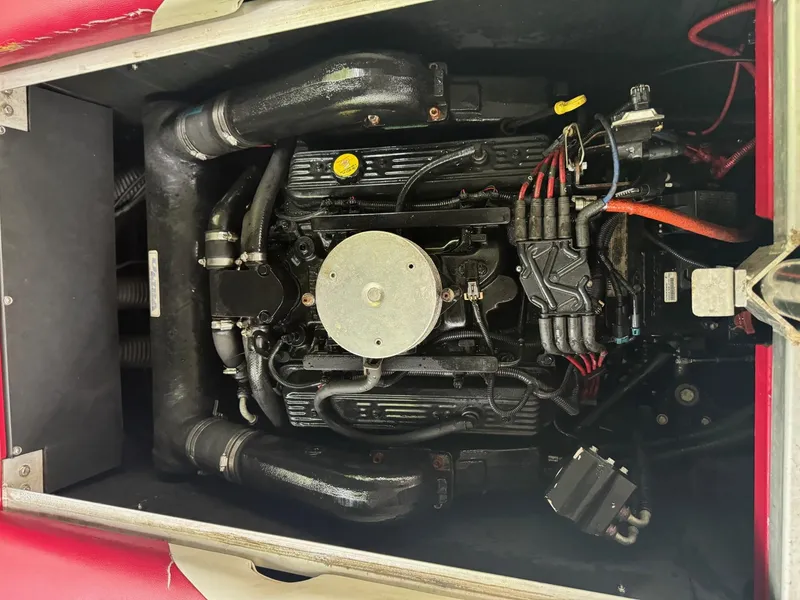 Slide: The Image of Engine of a 2011 Moomba Mobius LSV boat, showcasing intricate mechanical components. - 8