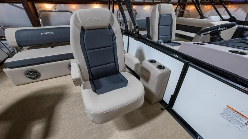 Slide: The Image of Interior of 2025 Harris Cruiser 230 SLDH with luxurious seating. - 10