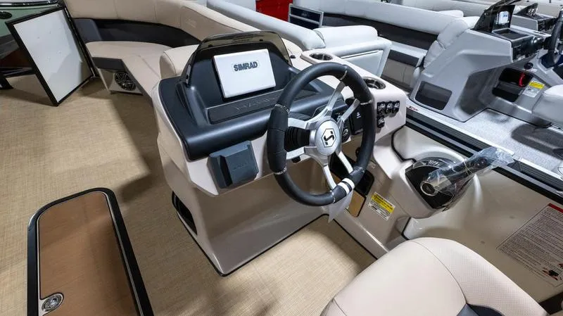 Slide: The Image of Interior of 2025 Harris Cruiser 230 SLDH with modern helm. - 12
