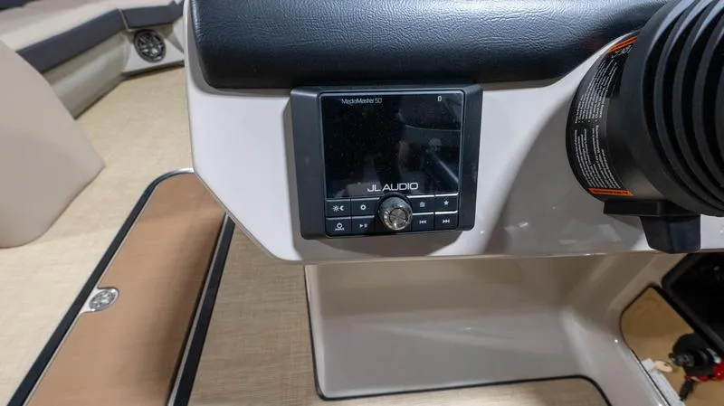 Slide: The Image of 2025 Harris Cruiser 230 SLDH audio system close-up. - 13