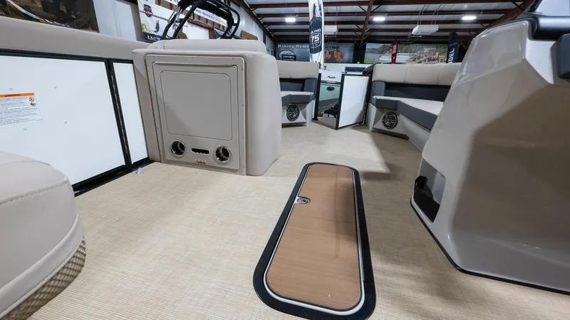 Slide: The Image of Interior of 2025 Harris Cruiser 230 SLDH with luxurious seating. - 16