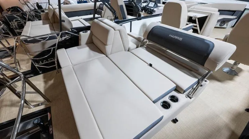 Slide: The Image of Interior of 2025 Harris Cruiser 230 SLDH with luxurious seating. - 21