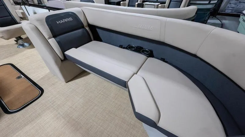 Slide: The Image of Interior of 2025 Harris Cruiser 230 SLDH with beige seating. - 3