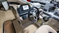 Slide: The Image of Interior of 2025 Harris Cruiser 230 SLDH with modern helm. - 37