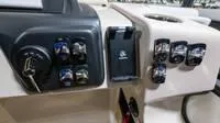 Slide: The Image of Dashboard of 2025 Harris Cruiser 230 SLDH with switches and controls. - 39