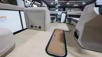 Slide: The Image of Interior of 2025 Harris Cruiser 230 SLDH with modern seating. - 41