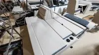 Slide: The Image of Interior of 2025 Harris Cruiser 230 SLDH with luxurious seating. - 47