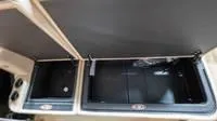 Slide: The Image of Interior of 2025 Harris Cruiser 230 SLDH with storage compartments. - 48