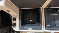 Slide: The Image of Interior of 2025 Harris Cruiser 230 SLDH with storage compartments. - 49