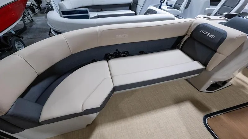 Slide: The Image of Interior of 2025 Harris Cruiser 230 SLDH with luxurious seating. - 6