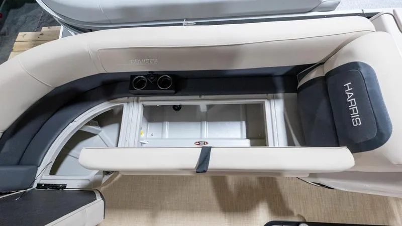 Slide: The Image of Interior of 2025 Harris Cruiser 230 SLDH with seating and storage. - 8