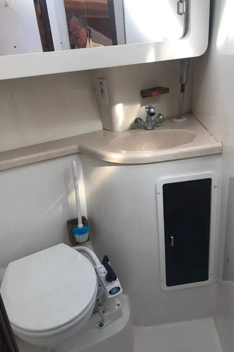 Slide: The Image of Bathroom interior of 1997 Catalina 400 sailboat with sink and toilet. - 10