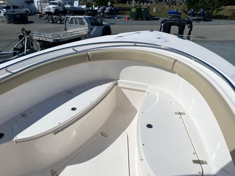 Slide: The Image of 2016 Pursuit S 280 Sport boat interior with seating and storage compartments. - 4