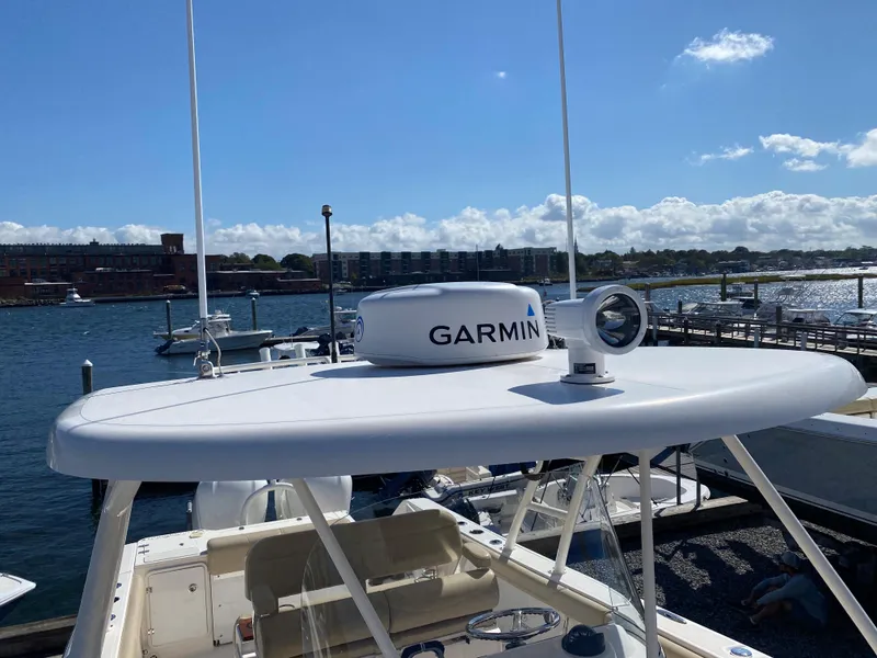 Slide: The Image of 2016 Pursuit S 280 Sport boat with Garmin radar on sunny waterfront. - 8