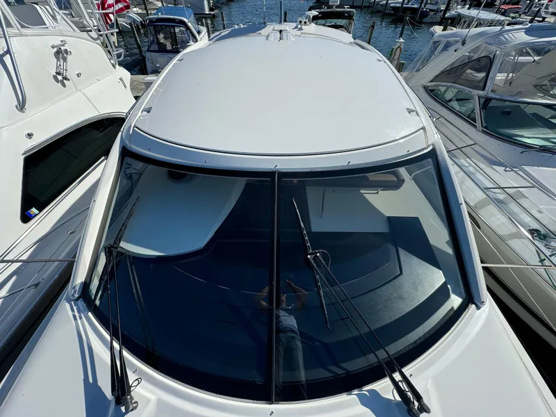 Slide: The Image of Prestige 440 S 2012 yacht, top view, docked among other boats. - 20
