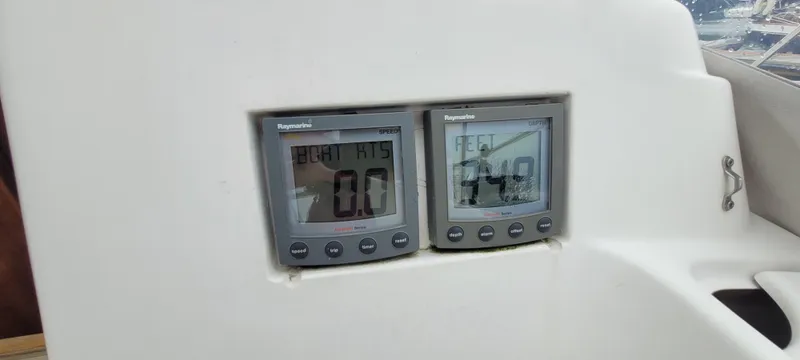Slide: The Image of Digital navigation instruments on a 1997 Saga 43 sailboat dashboard. - 25
