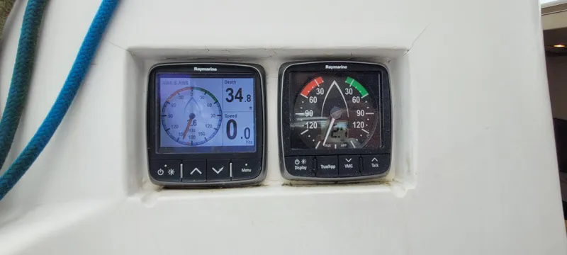 Slide: The Image of Digital navigation instruments on a 1997 Saga 43 sailboat dashboard. - 26