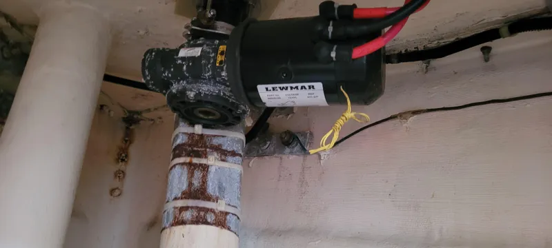 Slide: The Image of Electrical motor and wiring inside a 1997 Saga 43 boat. - 34