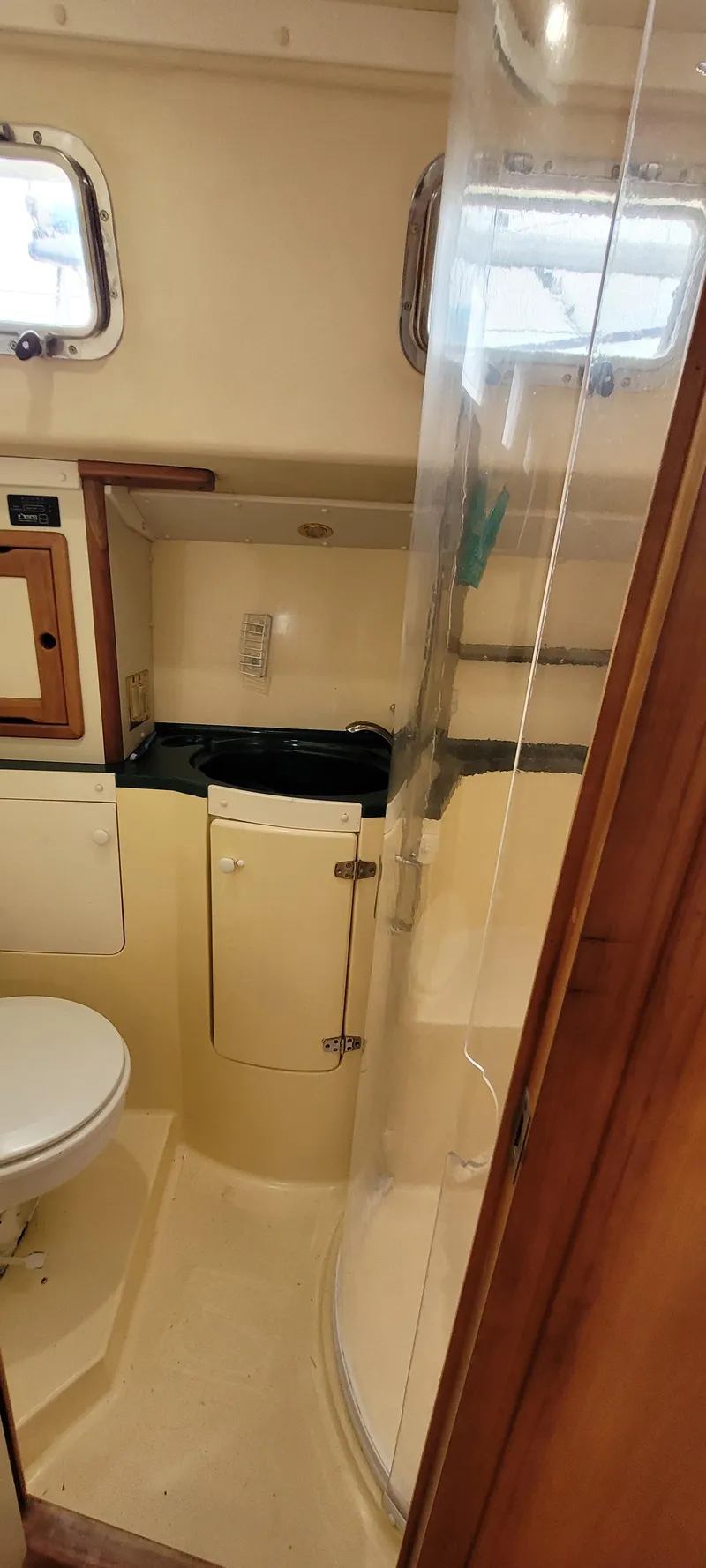 Slide: The Image of Bathroom interior of 1997 Saga 43 yacht with shower and toilet. - 45