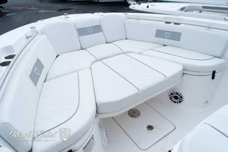 Slide: The Image of 2025 Sea Fox 288 Commander Center Console with luxurious white seating. - 10