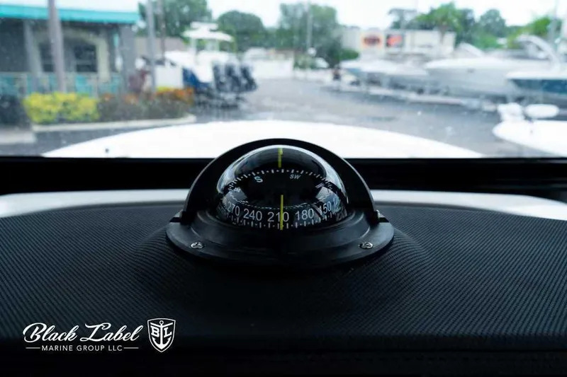 Slide: The Image of Compass on 2025 Sea Fox 288 Commander Center Console dashboard, Black Label Marine Group. - 19