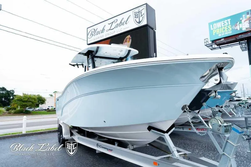 Slide: The Image of 2025 Sea Fox 288 Commander Center Console boat displayed at Black Label Marine Group. - 2