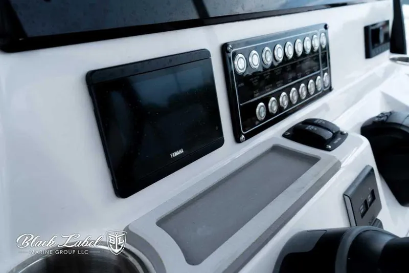 Slide: The Image of 2025 Sea Fox 288 Commander Center Console dashboard with Yamaha display and control panel. - 21
