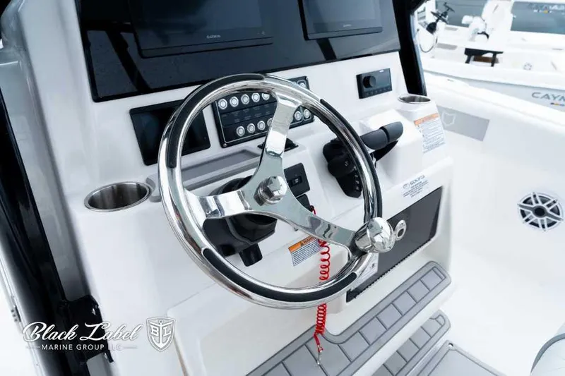 Slide: The Image of 2025 Sea Fox 288 Commander Center Console steering wheel and dashboard. - 23