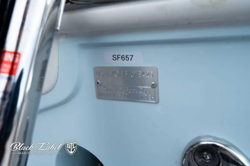Slide: The Image of 2025 Sea Fox 288 Commander Center Console identification plate with serial number SF657. - 5