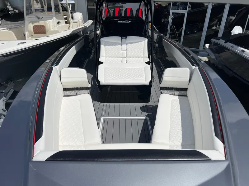 Slide: The Image of 2025 Nor-Tech 390 Sport Center Console with luxurious seating and sleek design. - 16