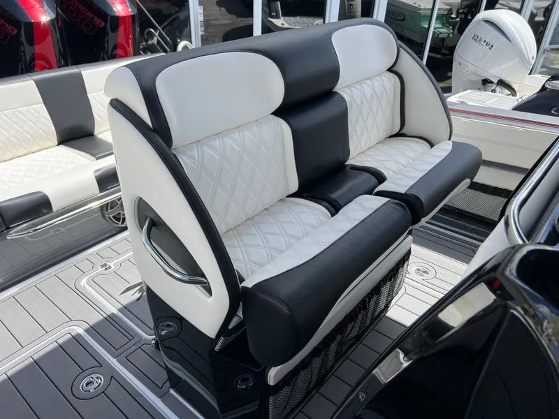 Slide: The Image of Luxurious seating on 2025 Nor-Tech 390 Sport Center Console boat. - 20
