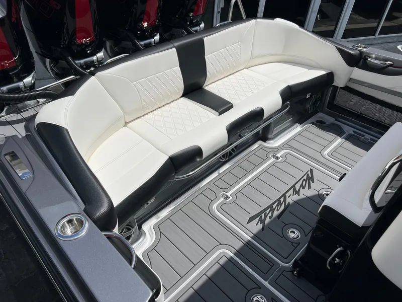 Slide: The Image of Luxurious seating on 2025 Nor-Tech 390 Sport Center Console boat with stylish interior design. - 21