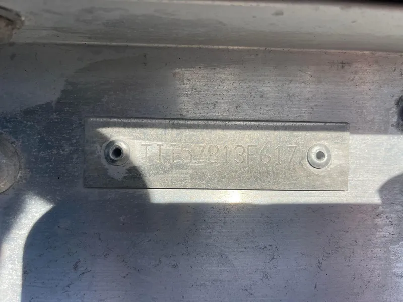 Slide: The Image of Serial number plate on 2017 Manitou 25 Oasis boat. - 7