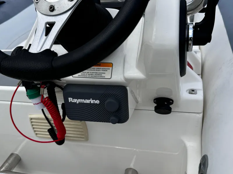 Slide: The Image of Close-up of 2019 Williams Jet Tenders Sportjet 395 steering console with Raymarine equipment. - 10