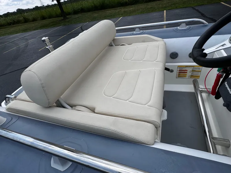 Slide: The Image of 2019 Williams Jet Tenders Sportjet 395, beige seating, outdoor view. - 14