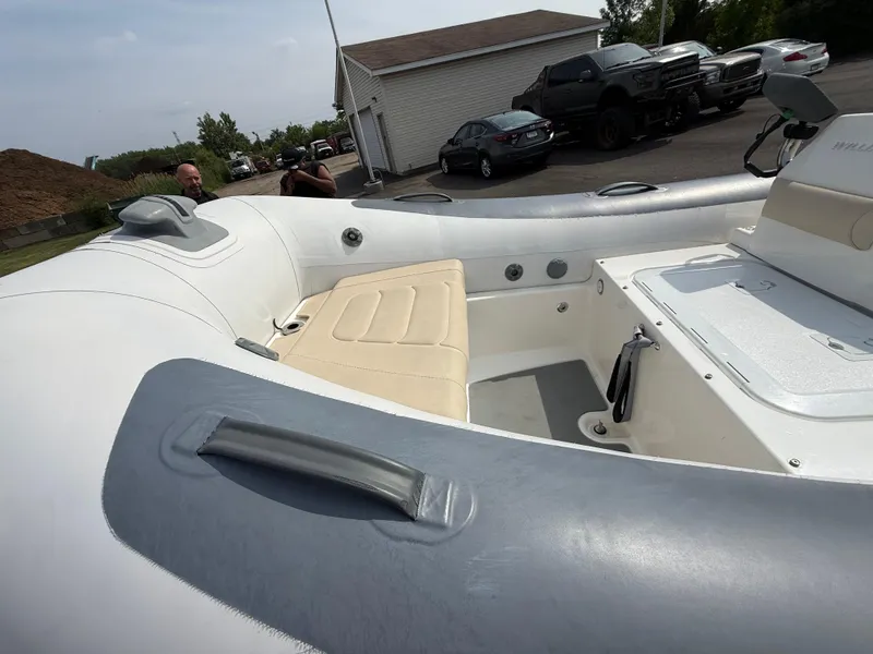 Slide: The Image of 2019 Williams Jet Tenders Sportjet 395, white interior, parked outdoors. - 26