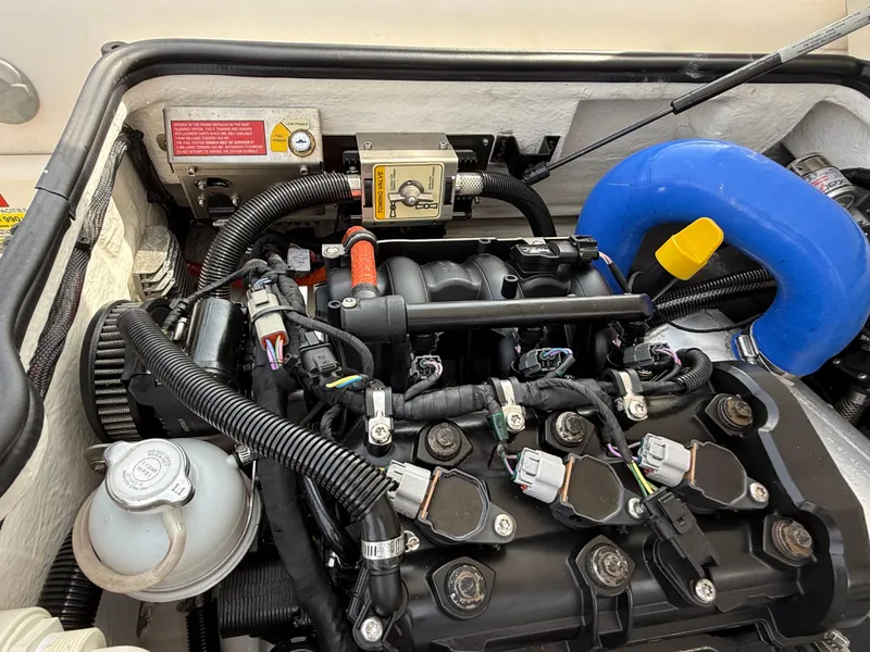 Slide: The Image of Engine compartment of a 2019 Williams Jet Tenders Sportjet 395, showcasing detailed components. - 30