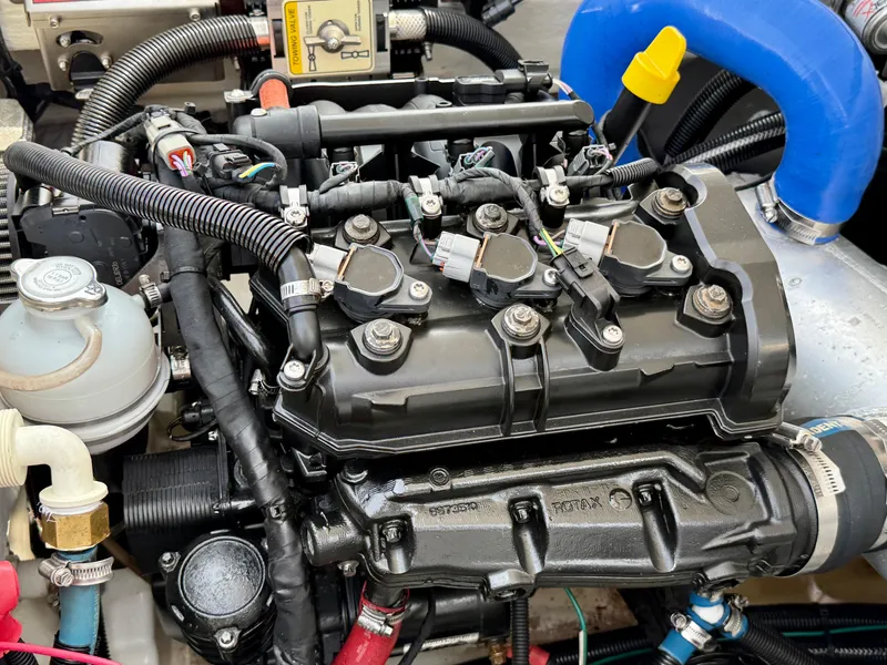 Slide: The Image of Engine of a 2019 Williams Jet Tenders Sportjet 395, showcasing intricate mechanical components. - 34