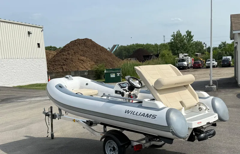Slide: The Image of 2019 Williams Jet Tenders Sportjet 395 on trailer in outdoor setting. - 36