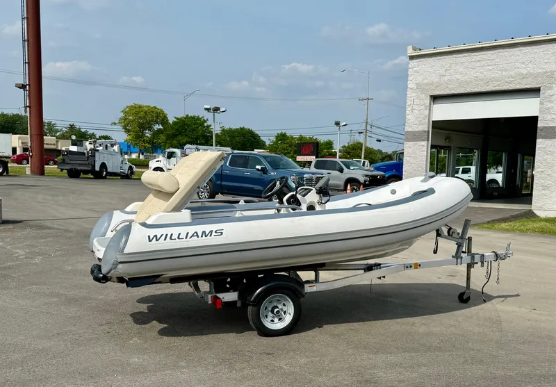 Slide: The Image of 2019 Williams Jet Tenders Sportjet 395 on trailer, parked outdoors near a building. - 37