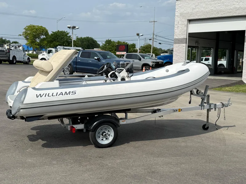 Slide: The Image of 2019 Williams Jet Tenders Sportjet 395 on trailer, parked outdoors. - 38