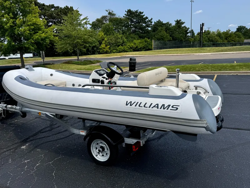 Slide: The Image of 2019 Williams Jet Tenders Sportjet 395 on trailer in parking lot. - 4