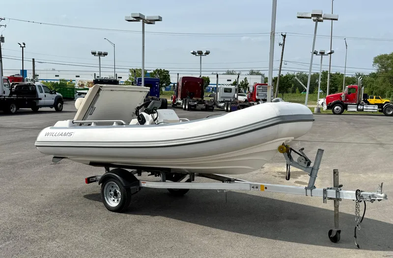 Slide: The Image of 2019 Williams Jet Tenders Sportjet 395 on trailer in parking lot. - 40