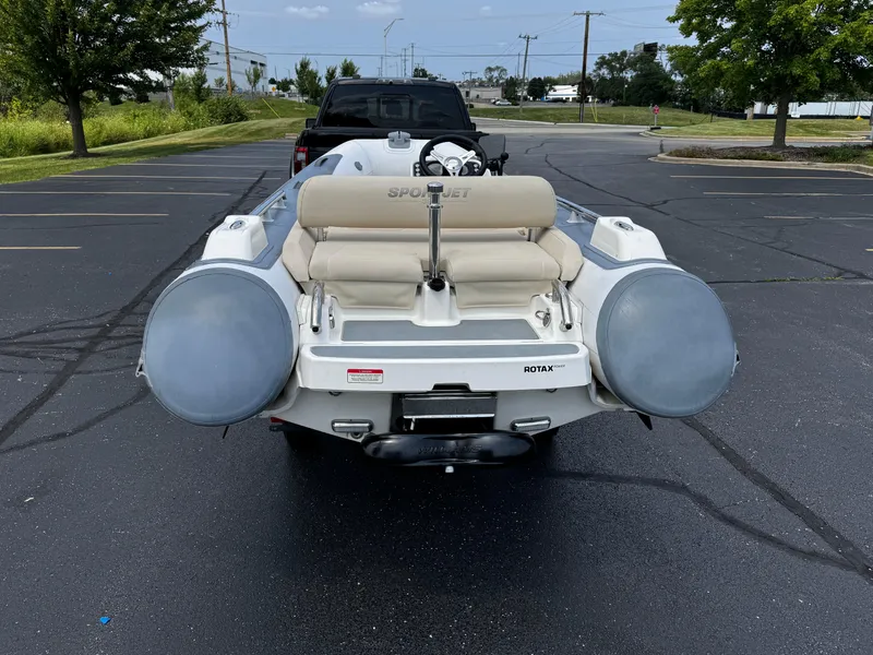 Slide: The Image of 2019 Williams Jet Tenders Sportjet 395 in parking lot, rear view. - 5