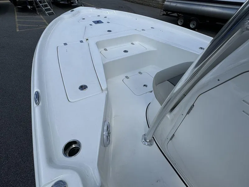 Slide: The Image of 2025 Key West 230 BR boat deck, spacious and sleek design. - 18