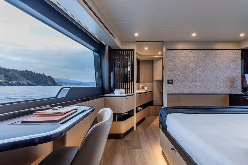 Slide: The Image of Luxurious interior of 2025 Absolute 56 FLY yacht with scenic ocean view. - 21