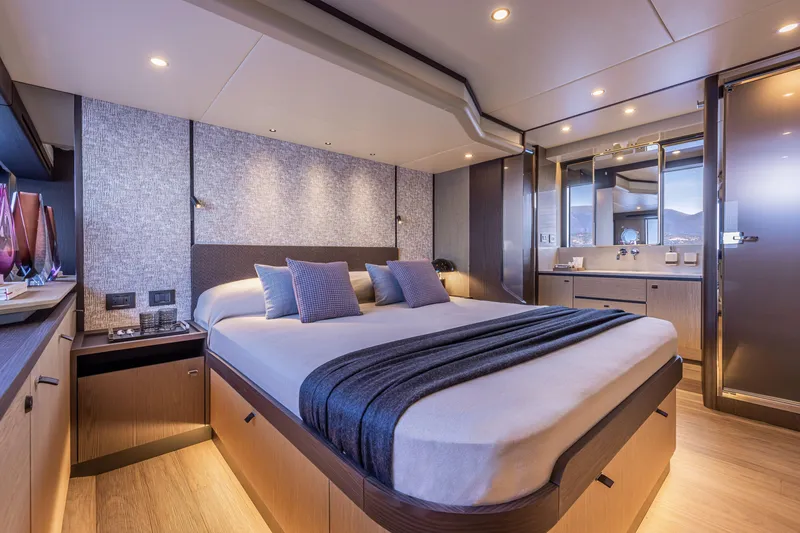 Slide: The Image of Luxurious bedroom interior of 2025 Absolute 56 FLY yacht with modern design. - 28